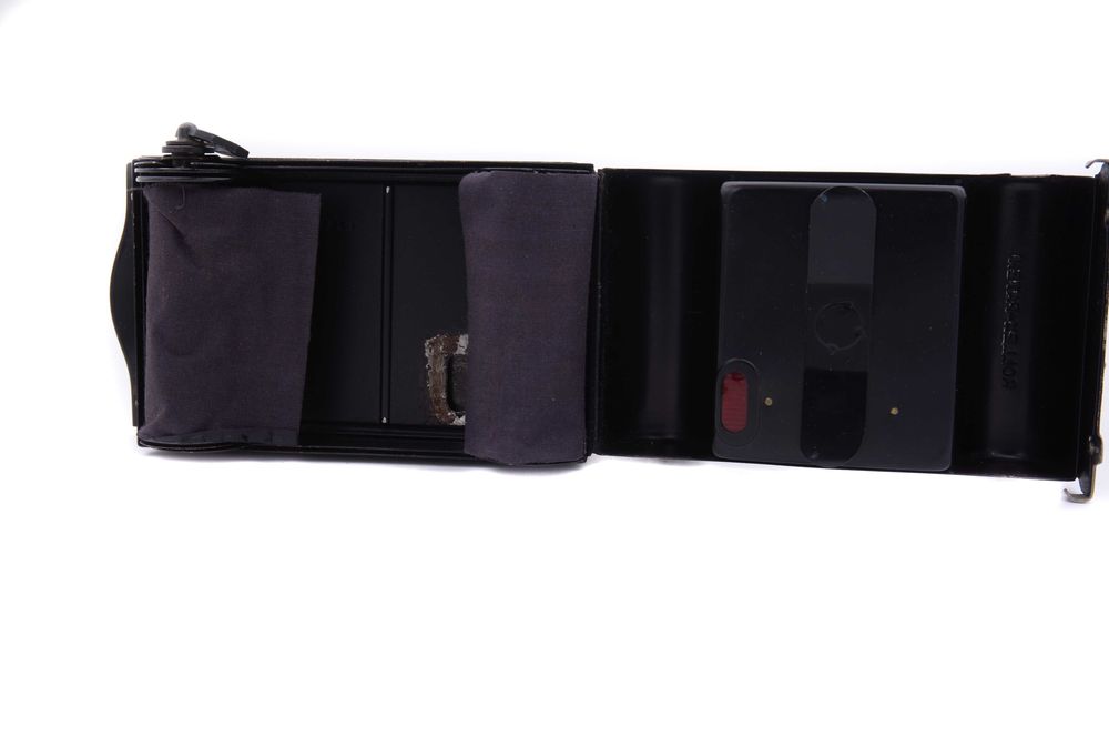 Casetă de film rulant (roll film holder / rollfilm back) 120