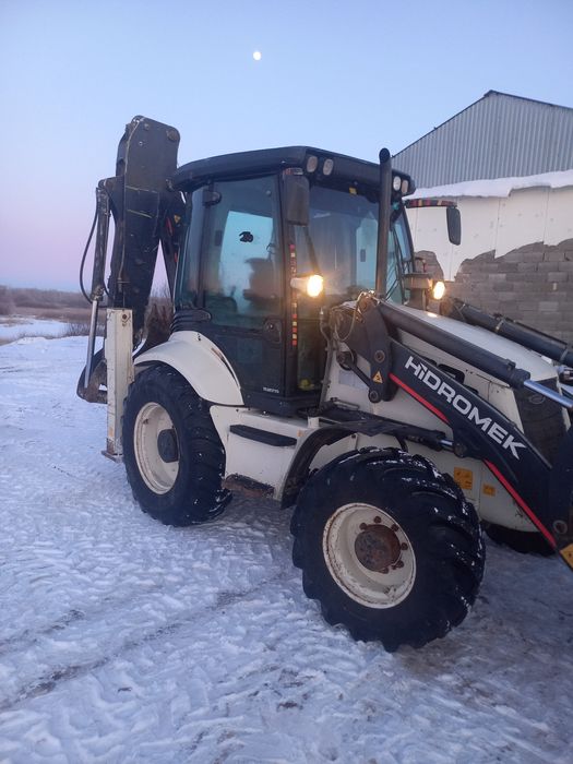 Продаю Экскаватор погрузчик Гидромек 102 в.