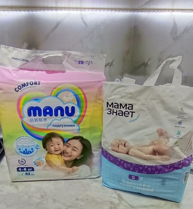 Подгузники Manu.