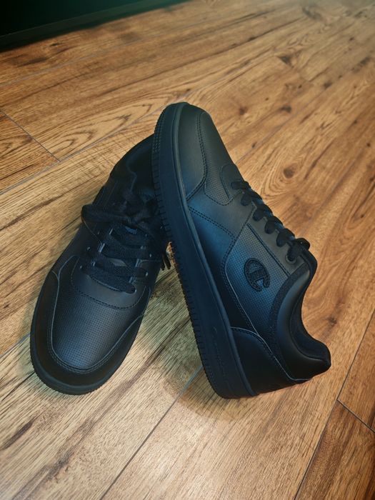 Champion Сникърси Rebound Low S21433-CHA-KK006 Черен #47.5
Изберете