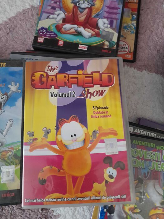 Cd-uri animate, tom si jery, strumfi, kemy curiosul si cu printese