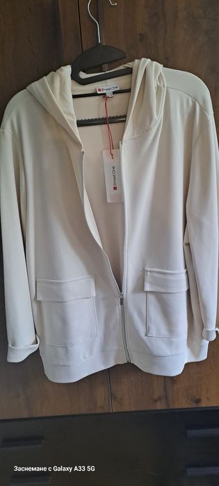 Нова Бяла,красива,елегантна жилетка,купена от Германия,не е носена