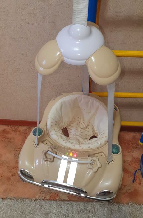 Музыкальная машинка-прыгунки