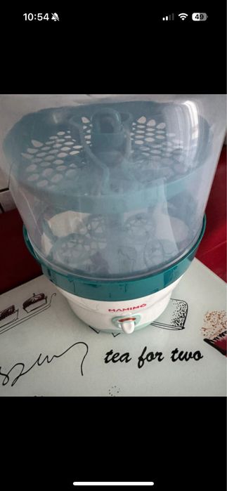 Sterilizator,folosit foarte putin,cutie