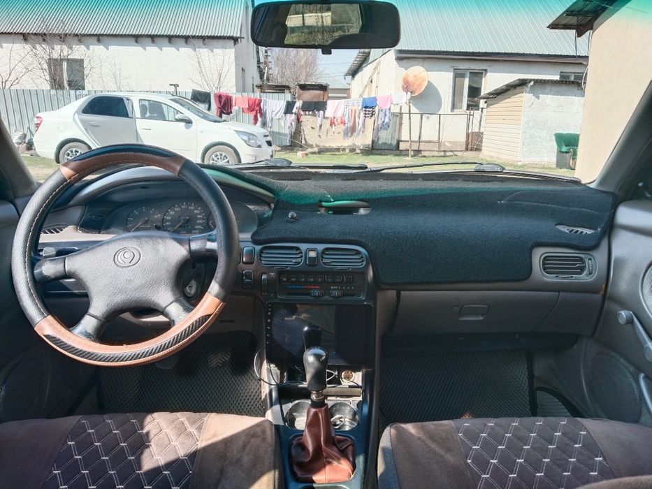 Мазда кронос 2 обем