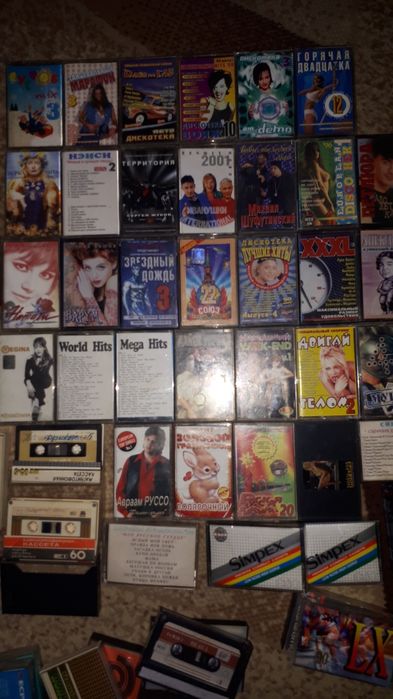 Видеокассеты фильмы.мульт.аудиокассеты.диски