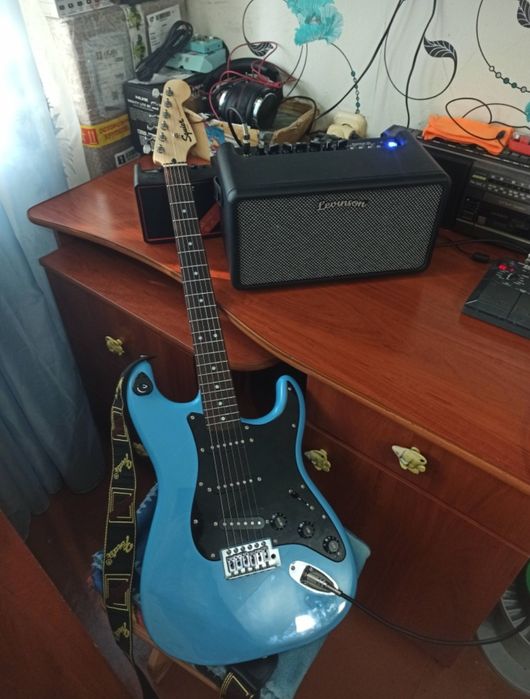 Гитарный комбоусилитель - 25 ватт.