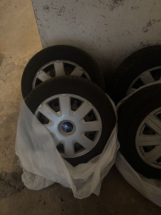 Vand anvelope brigestone cu jante de tabla