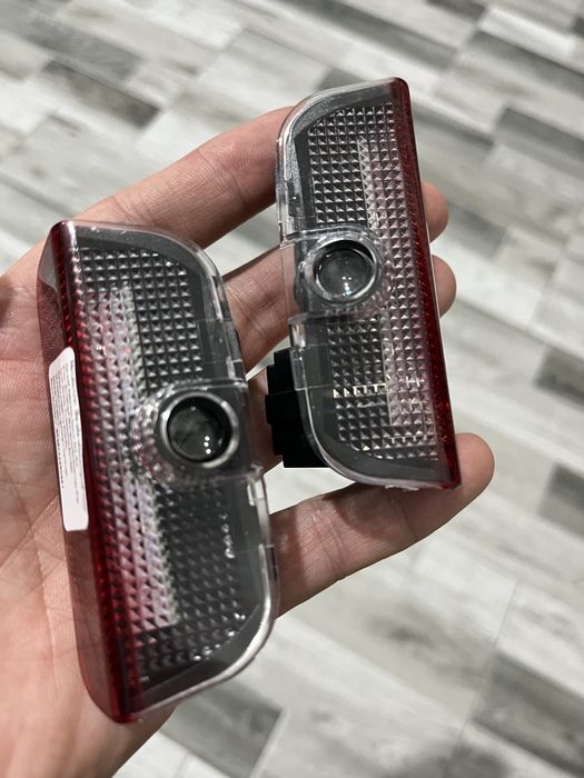 Set 2 Lămpi Proiectoare Logo Portieră - LED Dedicate Vw