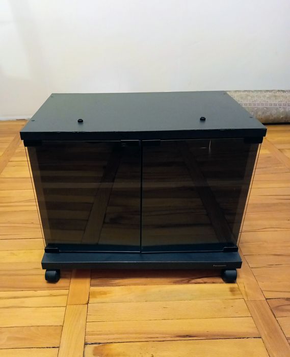 Тумбочка под технику Panasonik.