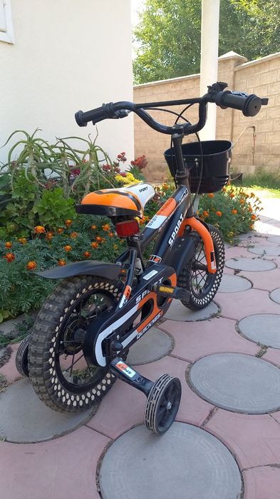 Детский четырехколестный велосипед