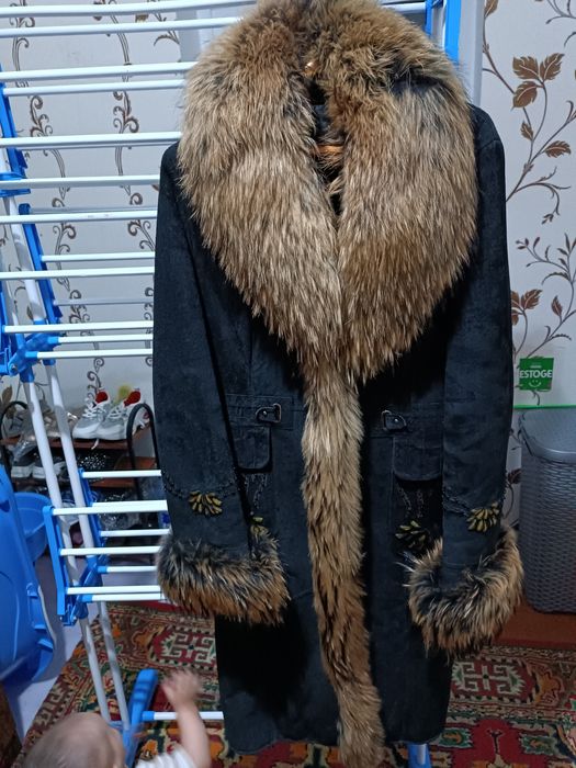 Palto yangi kiyilmagan