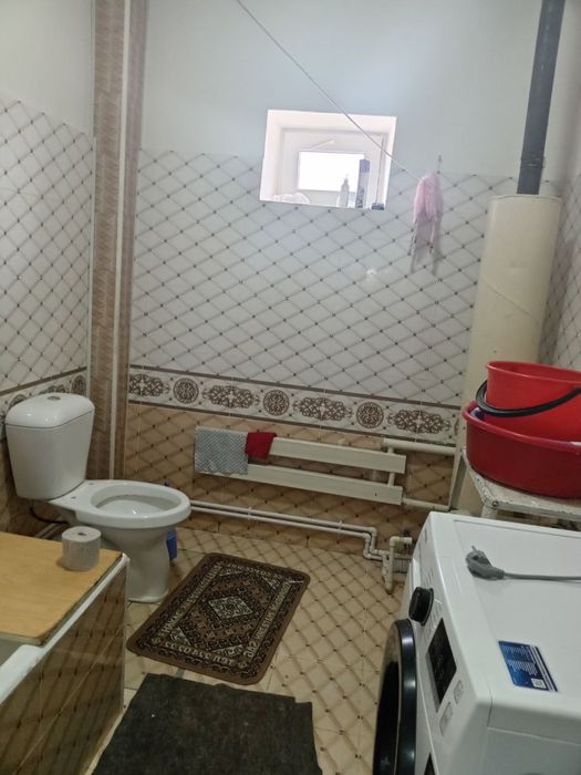 Дом на земле (Нукус)