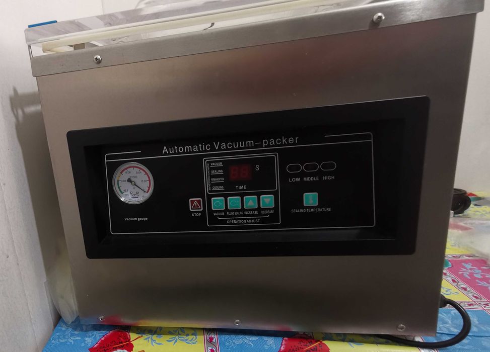 Вакуумный упаковщик