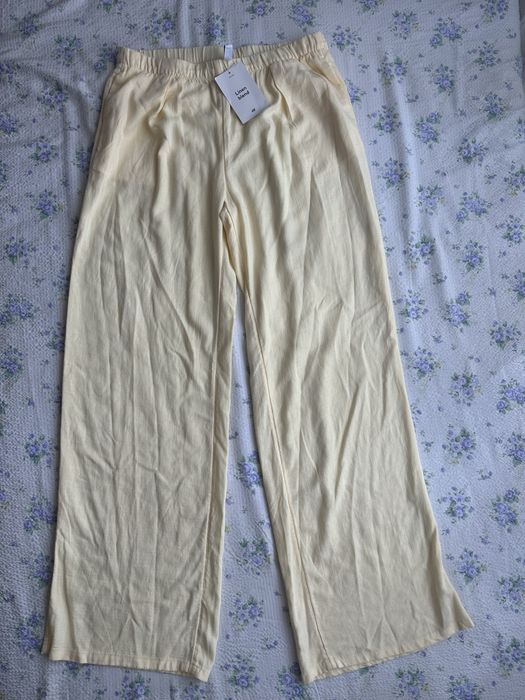 Pantaloni noi cu eticheta H&M