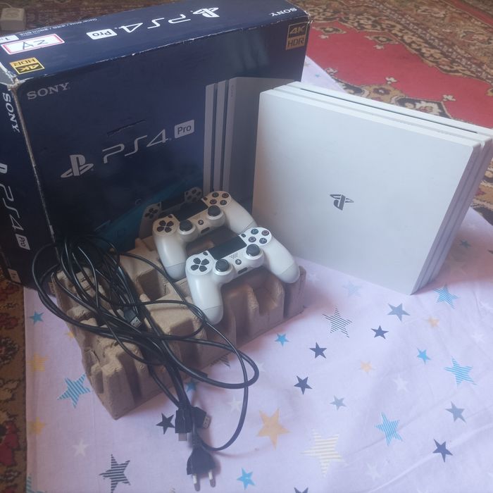 Playstation 4 Pro xotirasi  1 TB 18 ta oyini bor