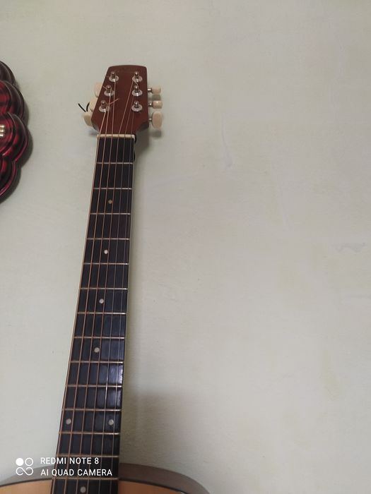 жагдайы зор .акустика гитар тары таза салынды.600000 мын келисемиз.тел