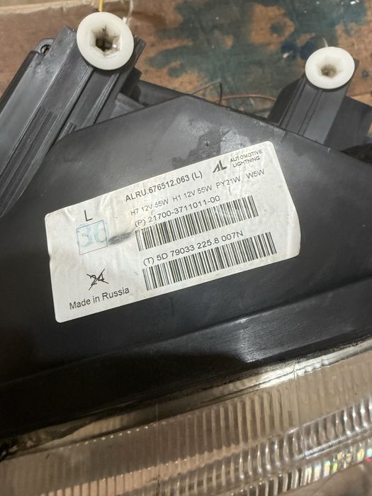 Фара приора 1 левая оригинал бош