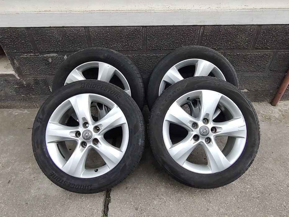 Vând Set Jante Opel 5x115 + Cauciucuri Vara DOT 2023 Bridgestone Import Germania