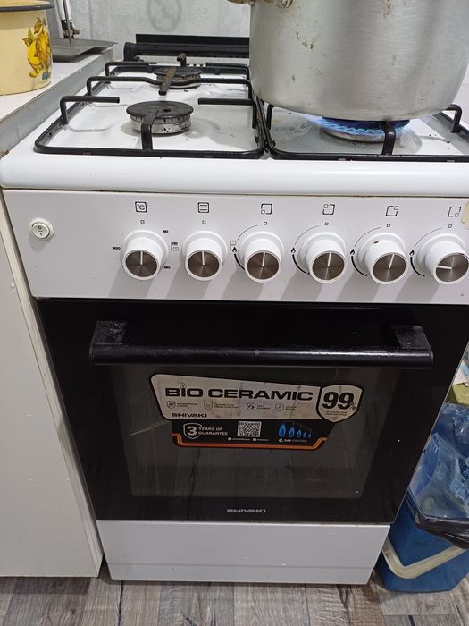 Газовая плита с духовкой с  электроподжигом.иг