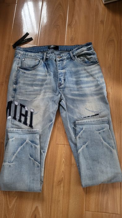 Blugi Amiri Varsity Logo