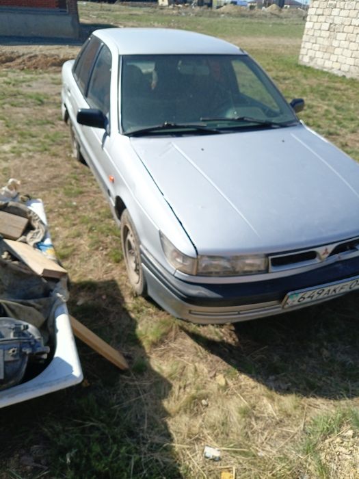 Митсубиси Лансер