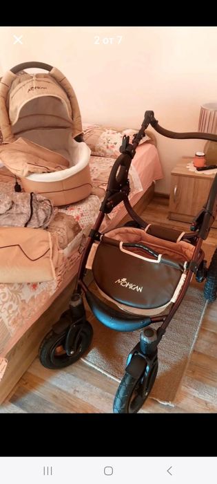 Количка Мохикан,в отлично състояние. Пълен комплект,два коша +