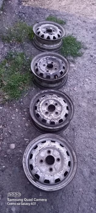 Диска мазда323 р13