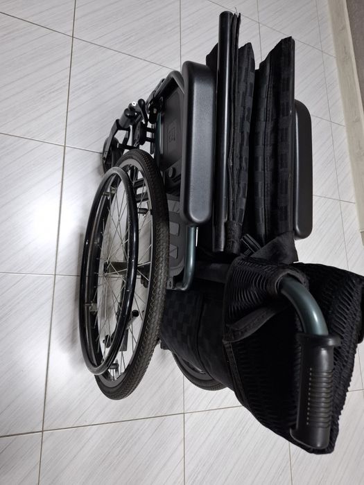 Инвалидная коляска