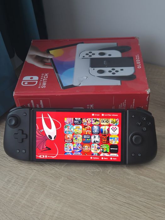 Nintendo Switch OLED Modat 512 gb + 74 Jocuri + Mobapad M6 HD – Stare excelentă