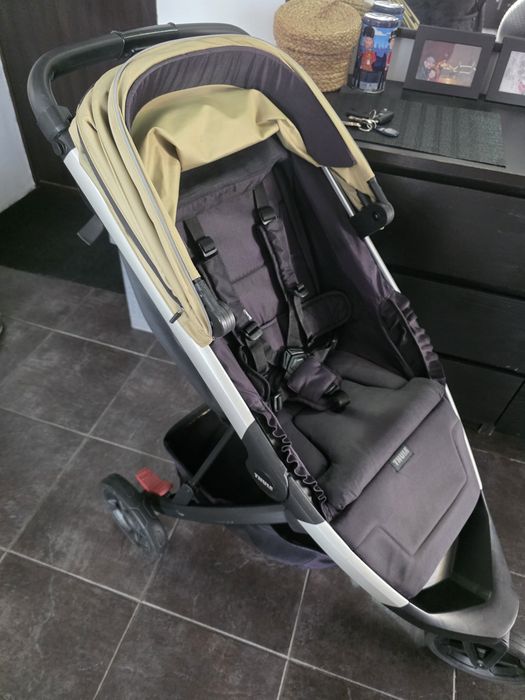 Carucior pliabil Thule Spring bej, cu suspensie, roti din spuma
