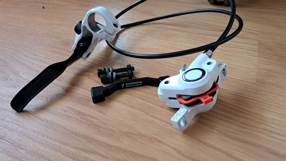 Хидравлична дискова задна спирачка Shimano бяла