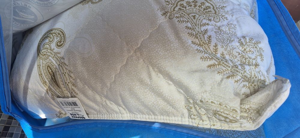 Продам одеяло и подушку новые