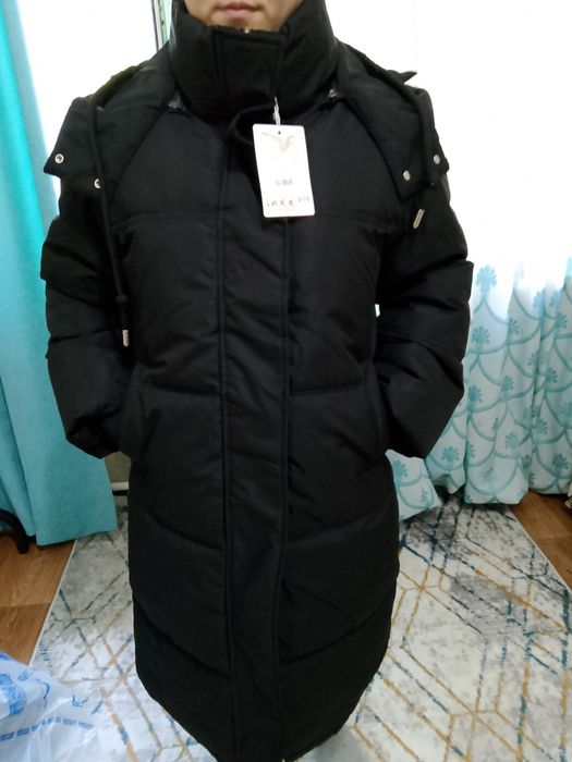Продам пуховик новый