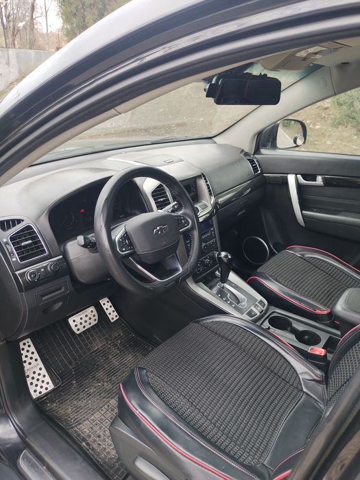 Captiva 3 Avtomat rangi qora benzinda yurilgan xolati butun.