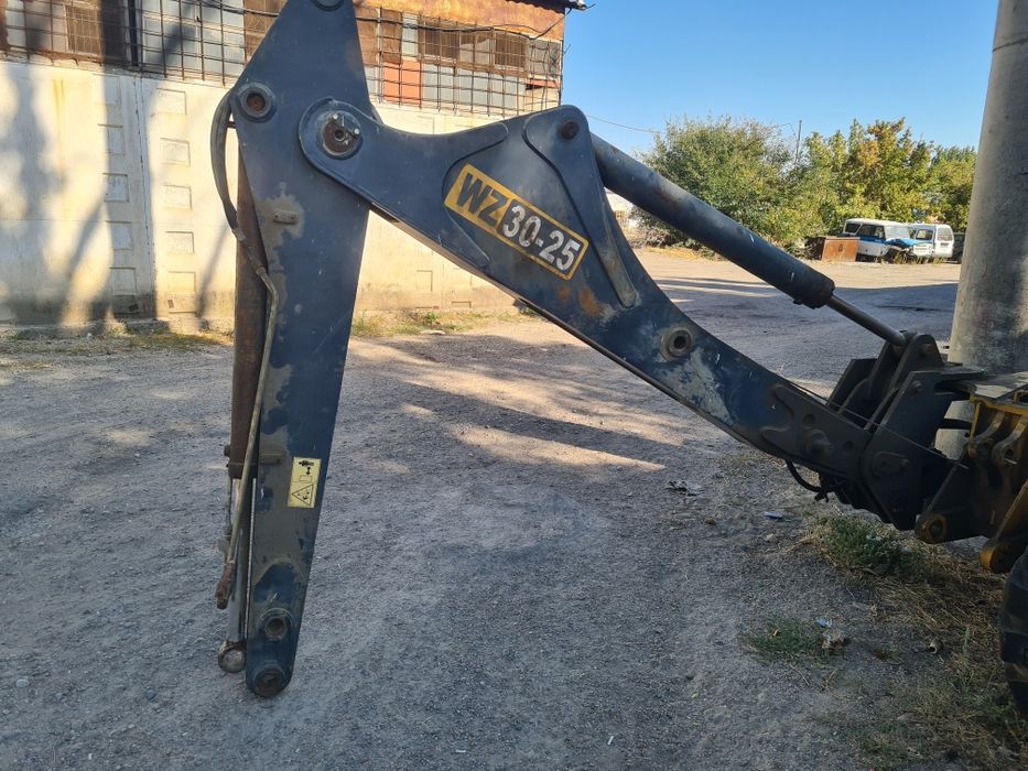 Эксковатор погрузчик по запчастям