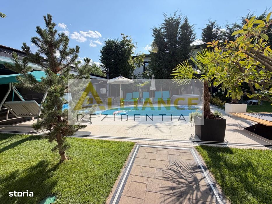 Casa P+1+M cu teren de 650 mp, piscina si curte complet amenajata