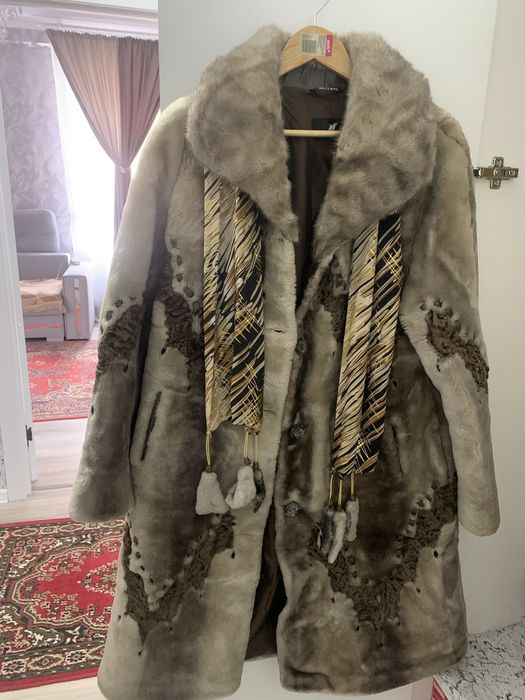 Женская мутоновая шуба