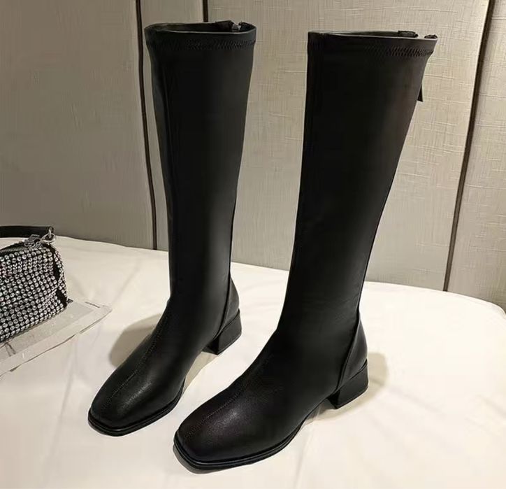 Продам новые осенние сапоги черные