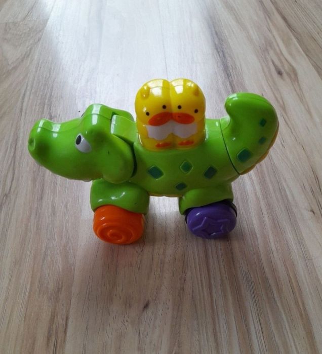 joc Jucarie bebelusi Fisher Price Crocodil apasa merge

crocodil cu ro