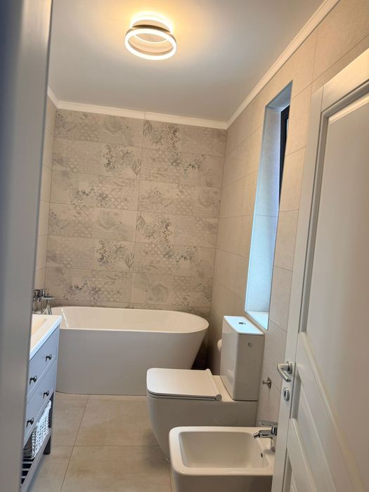 Casă tip duplex mobilată