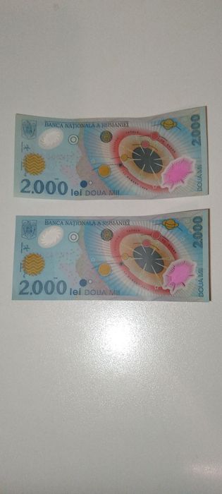 Bancnote 2000 lei Eclipsa 1999 -UNC -stare perfecta -serii 009B & 009E