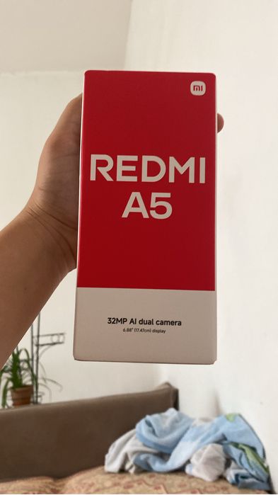 Телефон Redmi A5