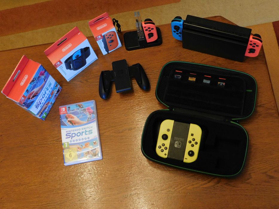 Consolă Nintendo Switch + 5 jocuri originale pe suport fizic (5 carduri) + accesorii complete