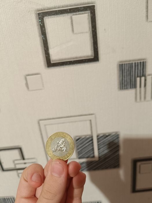 Монета 100 тенге