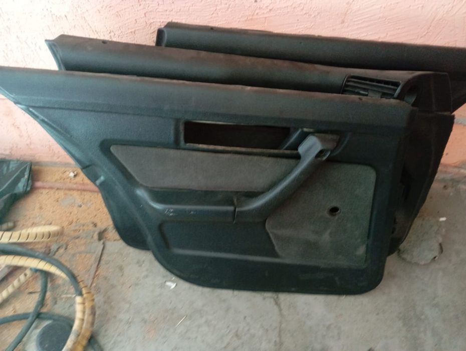 Дверные карты БМВ е34 обшивки