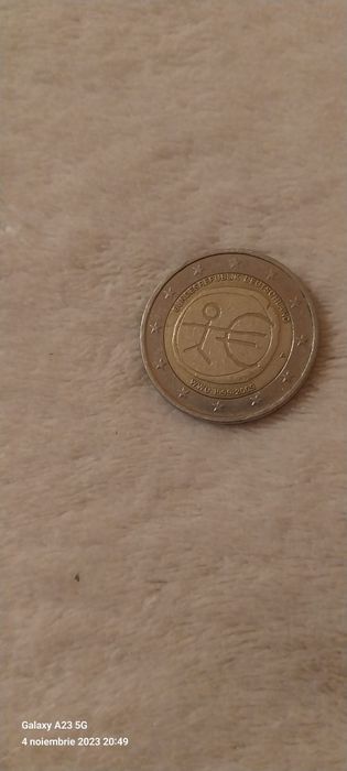 Moneda 2 euro cu defecte