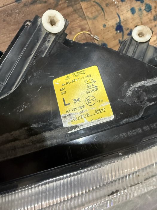 Фара приора 1 левая оригинал бош