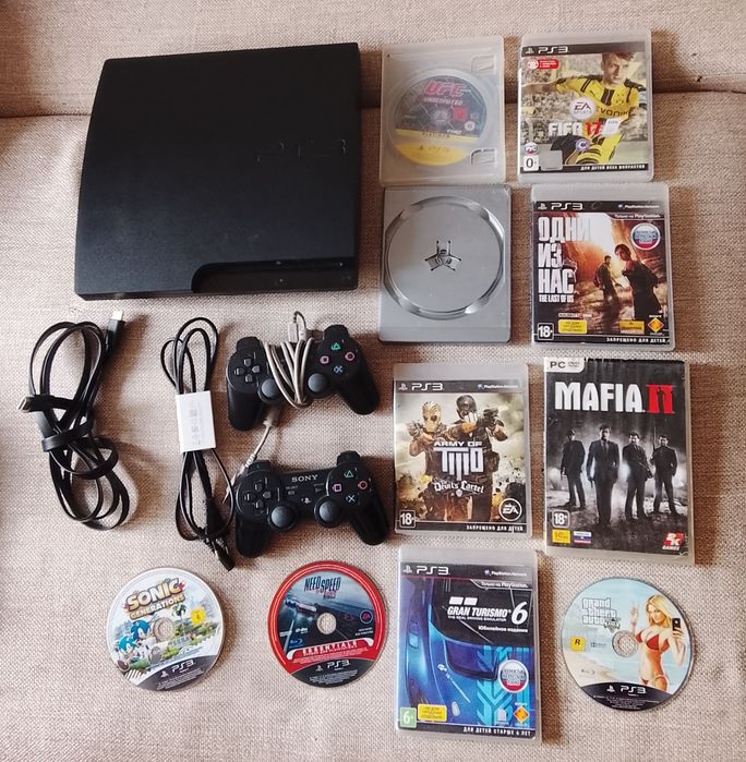 PS3 + 10 дисков + 2 джостика оригинальные