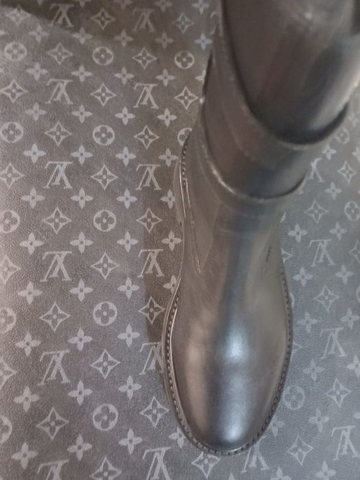 Женская сапоги,новые!